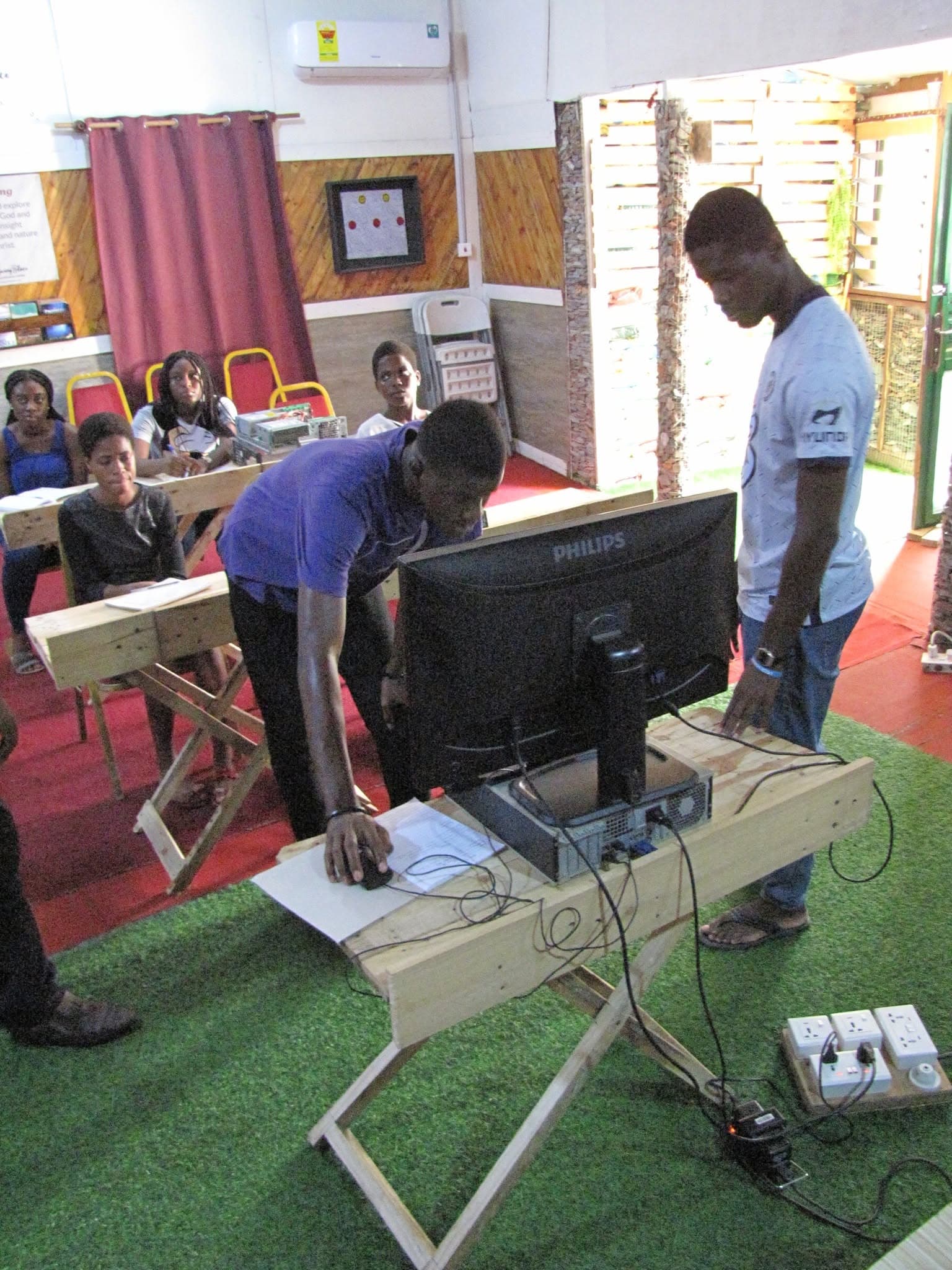 Learners setting up hardware during training